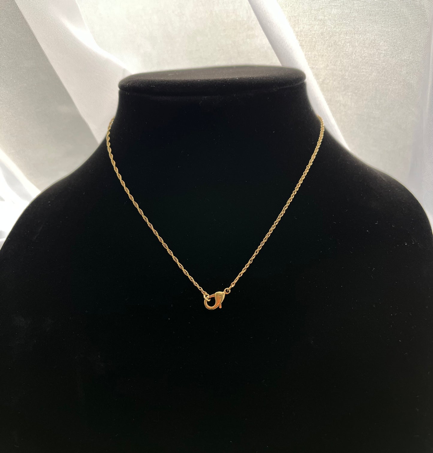 Avon Vintage cross gold tone necklace